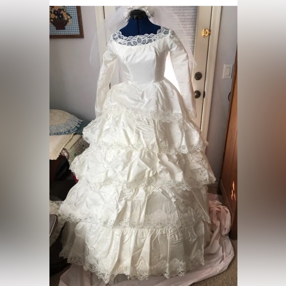 Vintage wedding dress and longer back train and veil